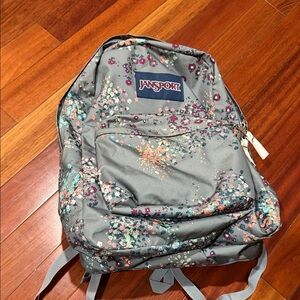 Jansport Gray Backpack with Pink, Teal and Orange Floral Accents